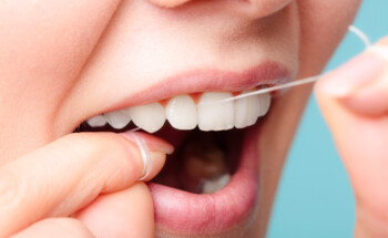 Fio dentário: Antes ou depois de escovar os dentes?